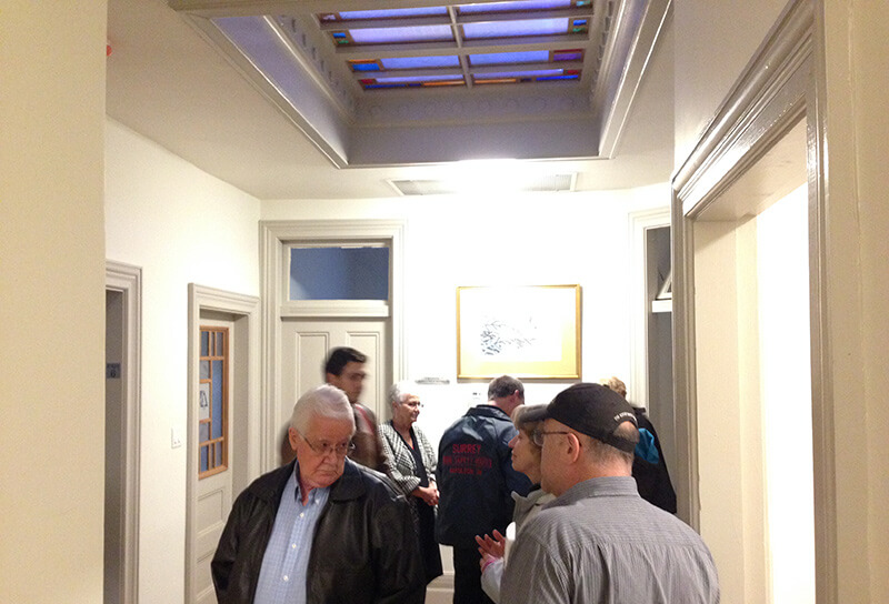 people tour second floor of harriston old post office